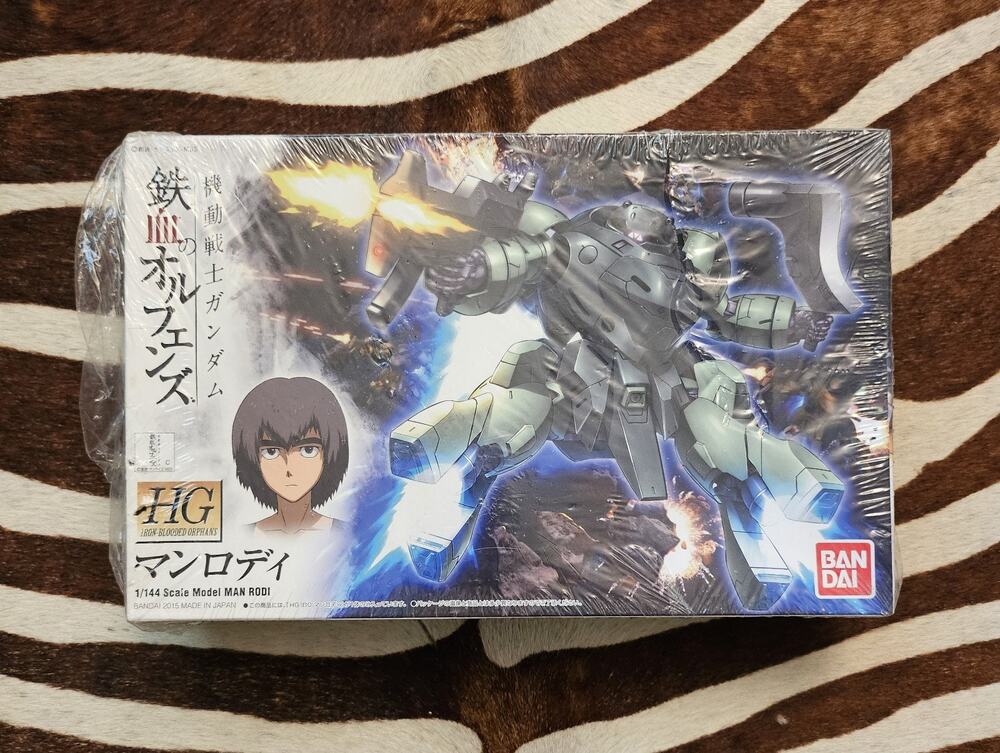 NEW BANDAI HG Iron-Blooded Orphans 009 MAN RODI Gundam 1/144 Scale Model Kit
